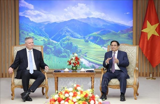 越南政府总理范明政会见经合组织秘书长马赛厄斯·科尔曼 hinh anh 1