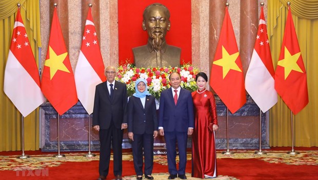 新加坡总统圆满结束对越南的国事访问 hinh anh 1