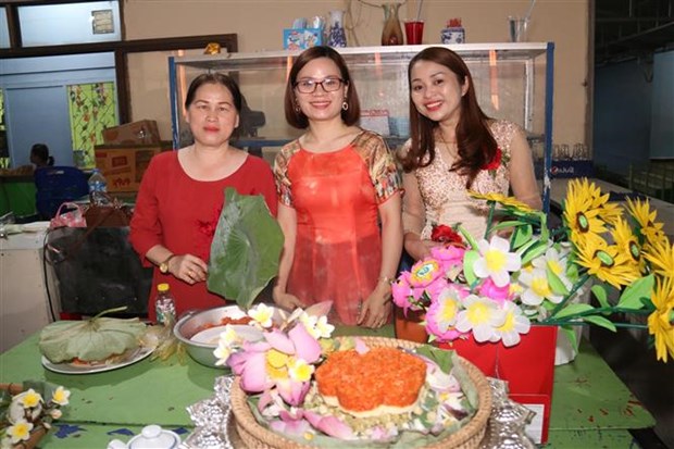 庆祝越南妇女节系列活动在老挝举行 hinh anh 1