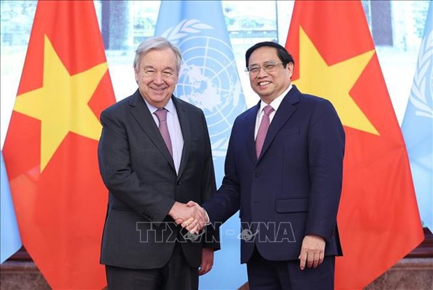 越南政府总理范明政会见联合国秘书长安东尼奥·古特雷斯 hinh anh 1