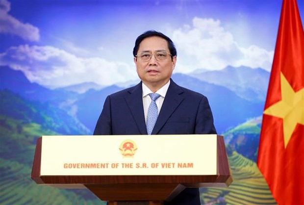 越南政府总理范明政在2022年世界生物峰会上发表讲话 hinh anh 1