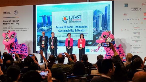 越南出席在新加坡举行的世界食品科技大会 hinh anh 1