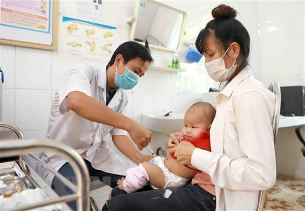 胡志明市扩大免疫规划中的疫苗接种率仅达76% hinh anh 1