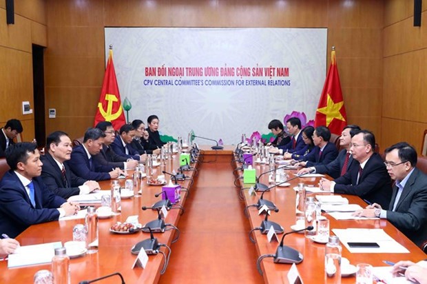 越南与老挝分享民运工作经验 hinh anh 1