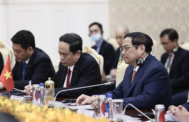 越南政府总理范明政与柬埔寨首相洪森进行会谈 hinh anh 2