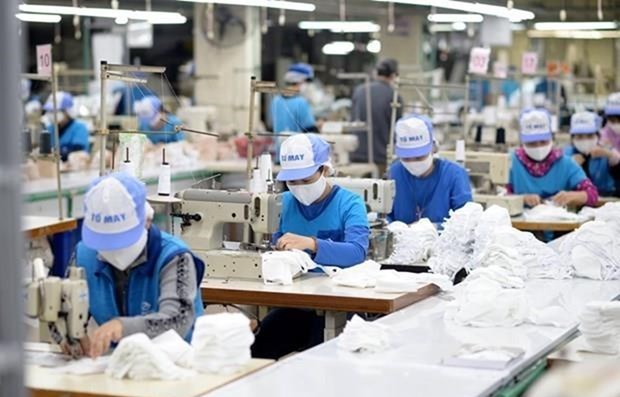 经济外交：越南纺织品服装实现“绿色生产” hinh anh 1