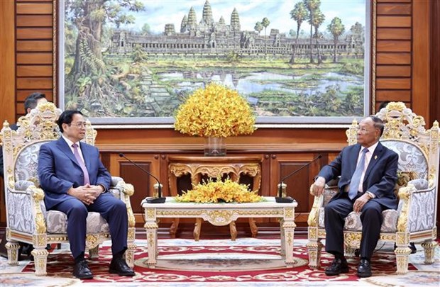 越南政府总理范明政会见柬埔寨国会主席韩桑林 hinh anh 1