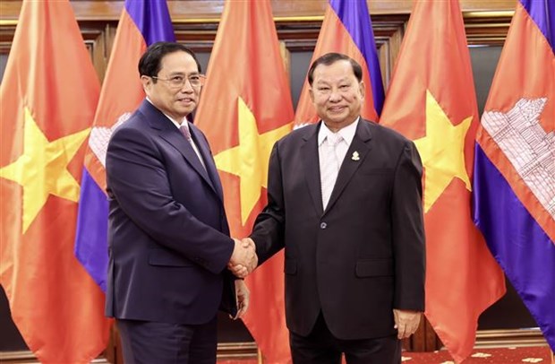 越南政府总理范明政会见柬埔寨参议院主席赛冲 hinh anh 1