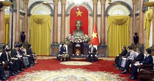 越南国家主席阮春福会见老挝人民革命党中央组织部代表团一行 hinh anh 2