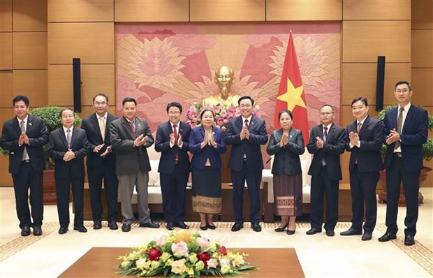 王廷惠会见老挝人民革命党中央组织部部长西赛•乐迪蒙颂一行 hinh anh 2