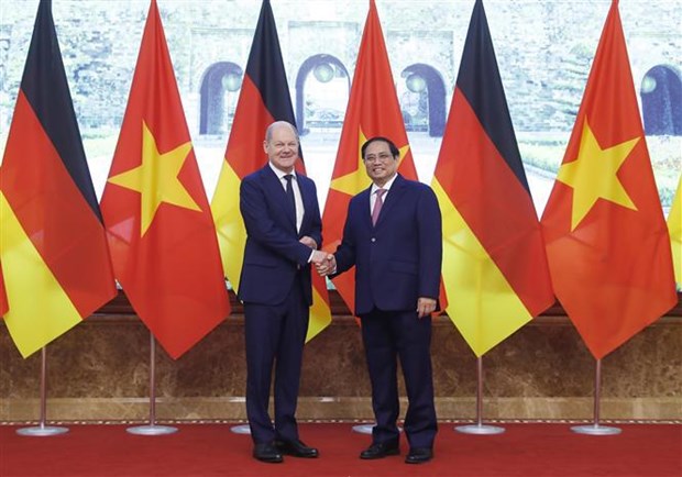 越南政府总理范明政与德国总理奥拉夫·朔尔茨举行会谈 hinh anh 1