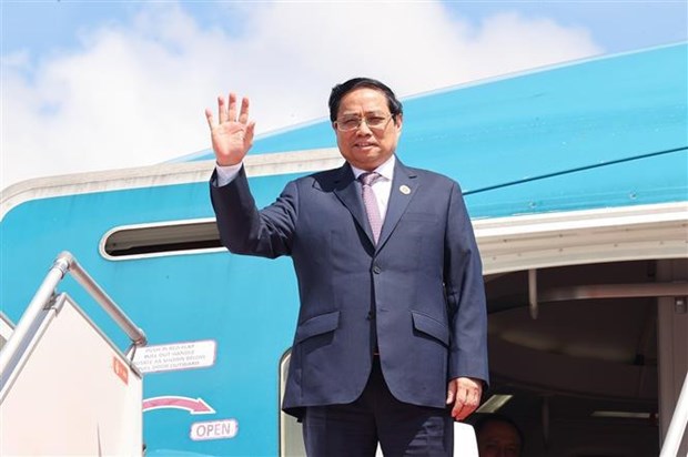 越南政府总理范明政抵达河内 结束对柬埔寨的工作访问 hinh anh 1
