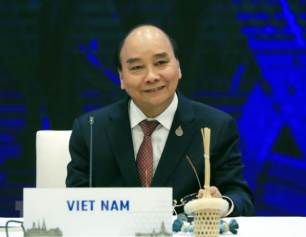 2022年APEC领导人会议周：越南国家主席阮春福出席APEC领导人与主席嘉宾对话 hinh anh 1