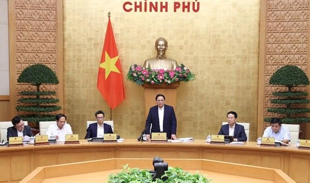越南政府总理范明政主持召开全国政策宣传工作视频会议 hinh anh 1