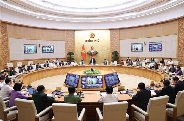 越南政府总理范明政主持召开全国政策宣传工作视频会议 hinh anh 2