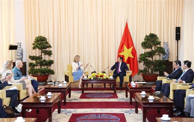 越南政府总理范明政会见荷兰外贸与发展合作大臣施赖纳马赫尔 hinh anh 2
