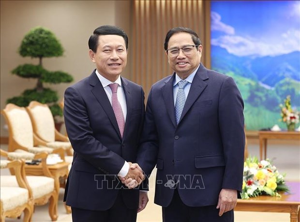 越南政府总理会见老挝政府副总理兼外交部长 hinh anh 1