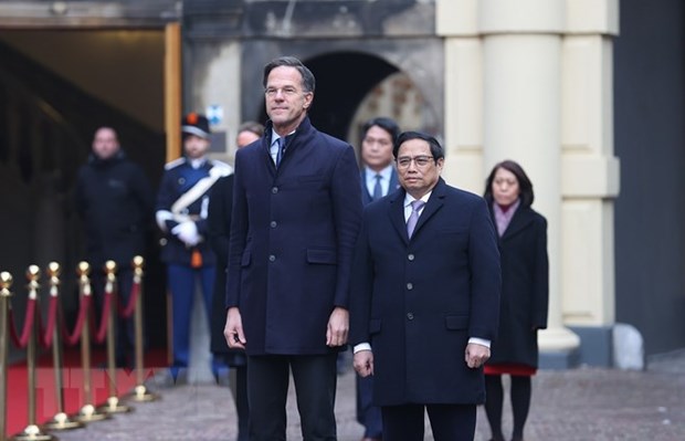 越南政府总理范明政访问荷兰 欢迎仪式在荷兰首相马克·吕特的主持下举行 hinh anh 2