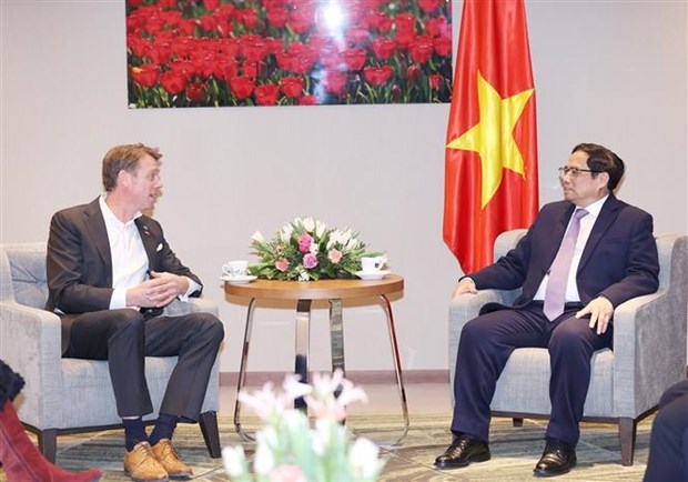政府总理范明政出席越南-荷兰商务论坛 会见荷兰各大集团领导 hinh anh 2