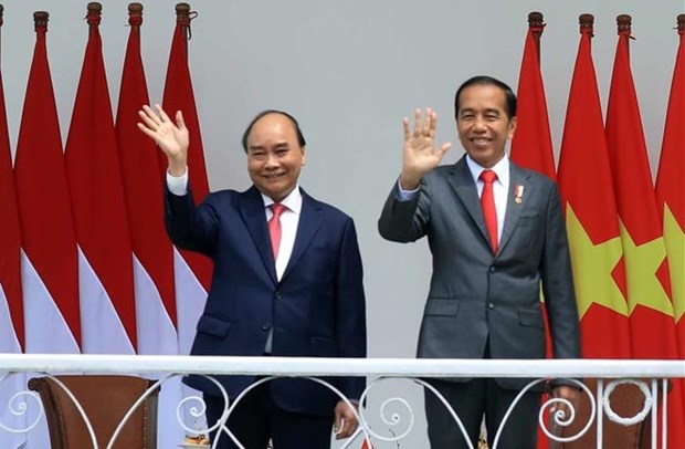 印尼总统佐科主持仪式 欢迎越南国家主席阮春福访问 hinh anh 1