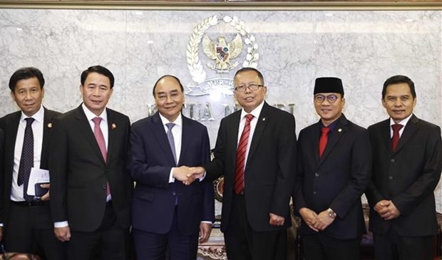 越南国家主席阮春福会见印尼国会议长普安和印尼人民协商会议代主席阿舒尔 hinh anh 2