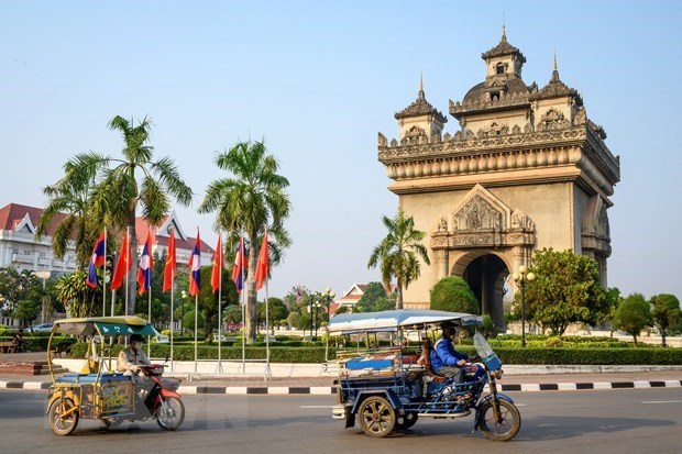 老挝完全取消入境防疫规定 hinh anh 1