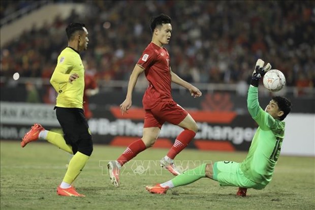 2022年东南亚足球锦标赛：越南队3比0击败马来西亚队 以两胜名列小组首位 hinh anh 2