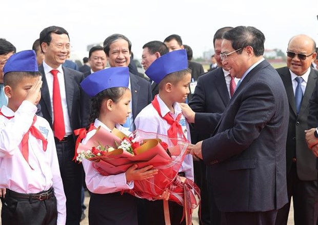 越南政府总理范明政圆满结束对老挝的正式访问 hinh anh 1
