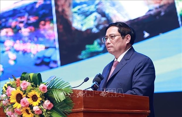 越南政府总理范明政主持召开中部以北地区和沿海地区经济社会发展会议 hinh anh 2
