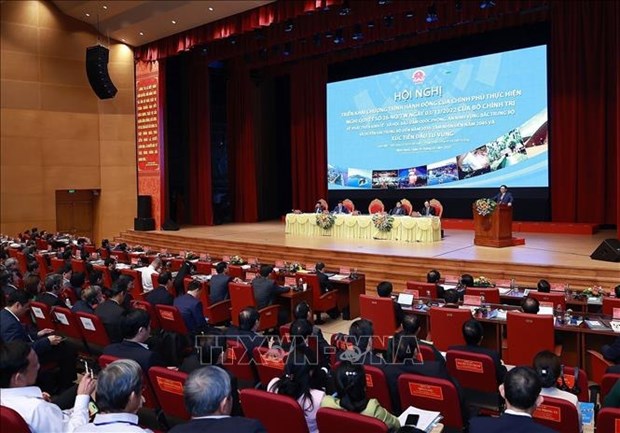 越南政府总理范明政主持召开中部以北地区和沿海地区经济社会发展会议 hinh anh 1