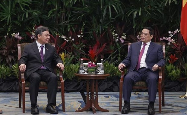 越南政府总理范明政会见新加坡各大企业领导 hinh anh 1