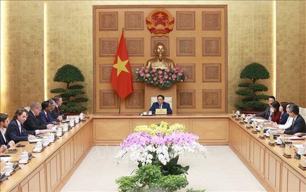 越南政府总理范明政会见欧盟-东盟商务理事会和越南欧洲商会代表团 hinh anh 1