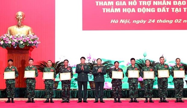 赴土耳其开展地震救援的越南人民军救援队表彰大会在河内举行 hinh anh 3