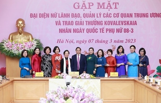 越南政府总理范明政：为越南妇女发挥积极作用营造良好环境和创造有利条件 hinh anh 1