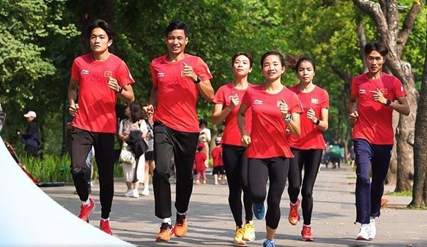近1500人参加响应第19届亚运会的跑步活动 hinh anh 1