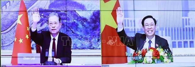 越南国会主席王廷惠与中国全国人大常委会委员长赵乐际举行视频会谈 hinh anh 2