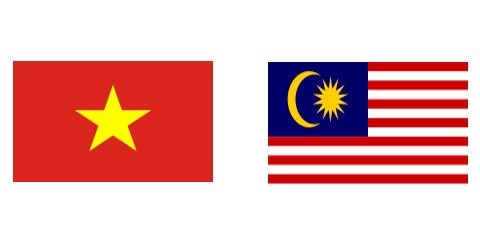 越南与马来西亚两国领导人就两国建交50周年互致贺电 hinh anh 1