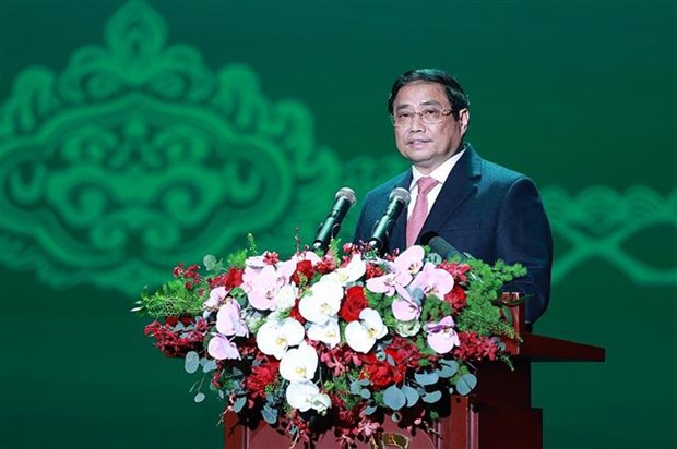 越南政府总理范明政：实施审慎、主动、灵活、及时、高效的货币政策 hinh anh 1