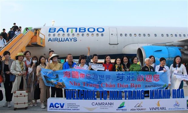 150 名来自中国澳门的游客赴庆和省旅游 hinh anh 1