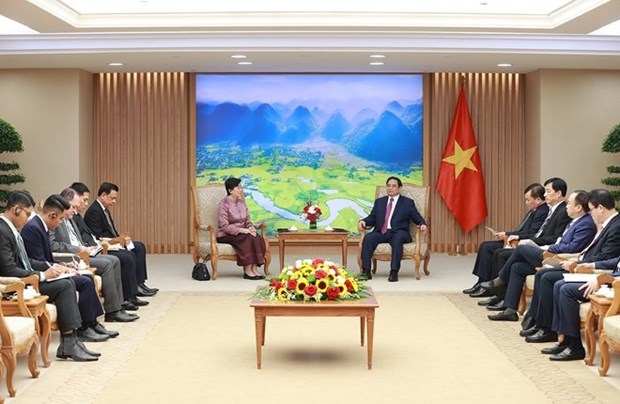 越南政府总理范明政会见柬埔寨新任驻越南大使谢金塔 hinh anh 1