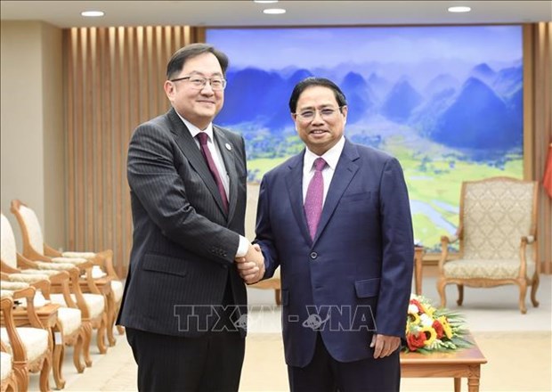 越南政府总理范明政会见马来西亚驻越南大使陈扬泰 hinh anh 1