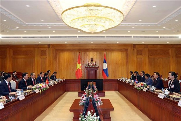 越南国家主席武文赏会见老挝国家领导人 hinh anh 3