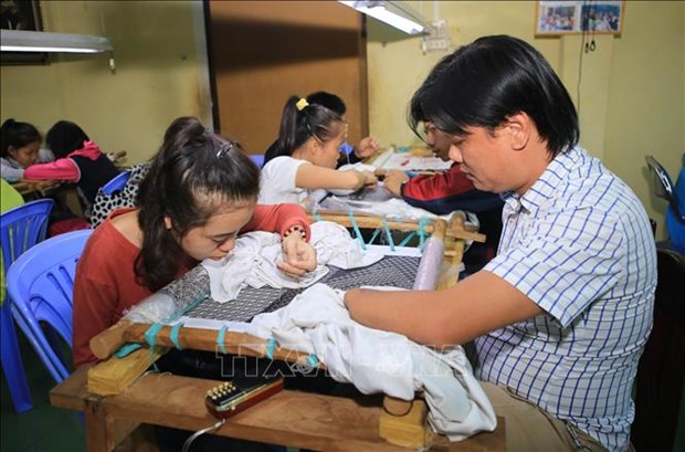 越南残疾人日: 需为残疾人创造更多就业机会 hinh anh 1