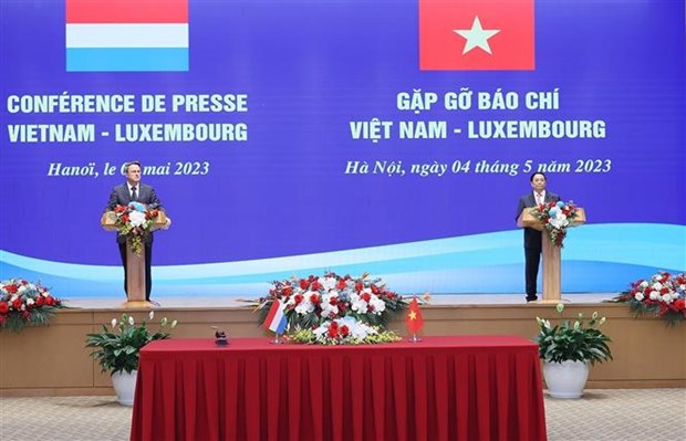 越南政府总理范明政与卢森堡大公国首相格扎维埃·贝泰尔举行会谈 hinh anh 3