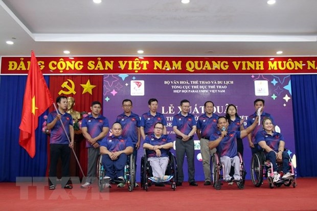 越南残疾人体育代表团出征第12届东南亚残疾人运动会 hinh anh 1