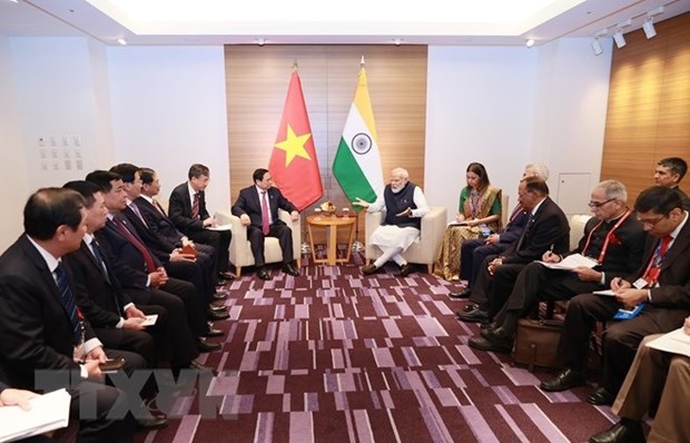 越南政府总理范明政会见加拿大、印度和科摩罗领导 hinh anh 2