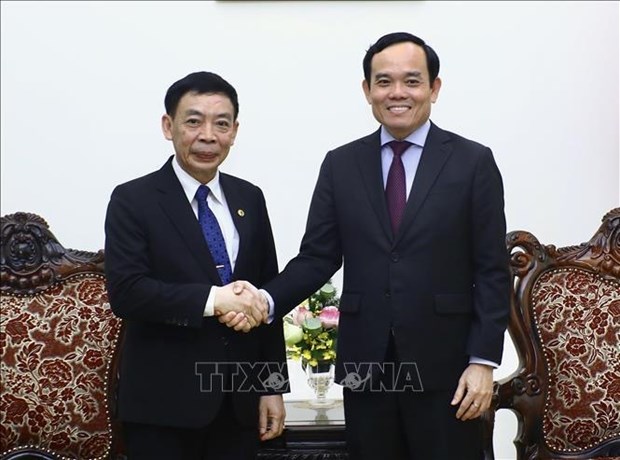 越南政府副总理陈流光会见老挝内政部部长 hinh anh 1