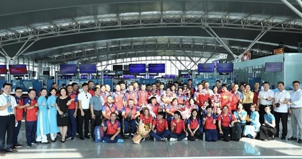 越南残疾人体育代表团启程赴柬参加第12届东盟残疾人运动会 hinh anh 1
