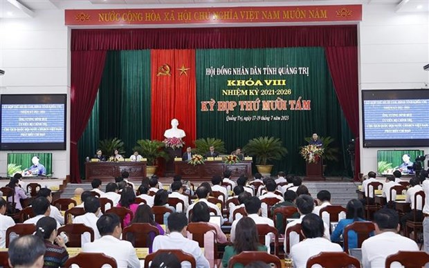 国会主席王廷惠出席广治省人民议会第十八次会议开幕式 hinh anh 1