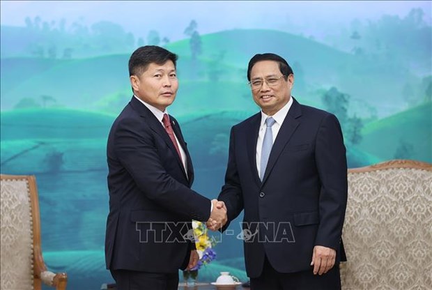 越南政府总理范明政会见蒙古国法律内务部长尼亚木巴特尔 hinh anh 1